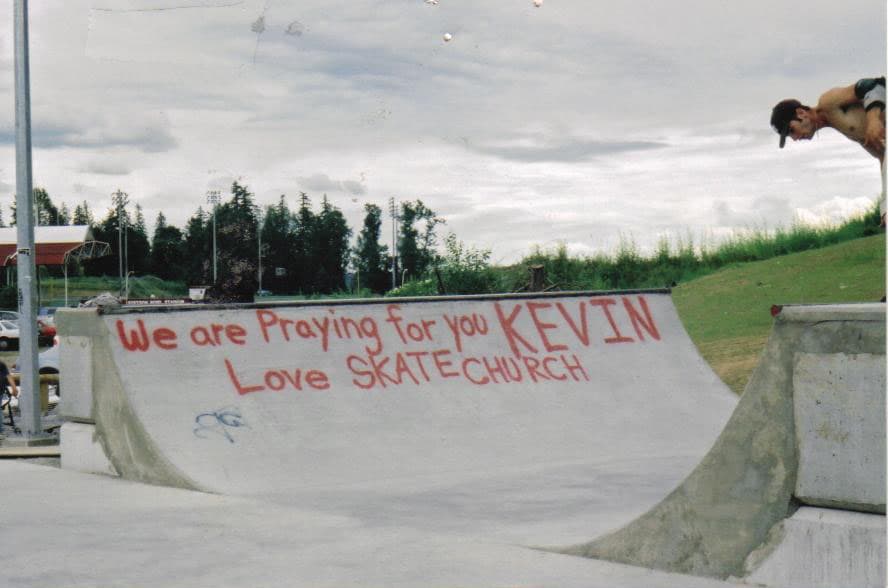 A skate park ramp painted with the words: We are praying for you Kevin, love SkateChurch